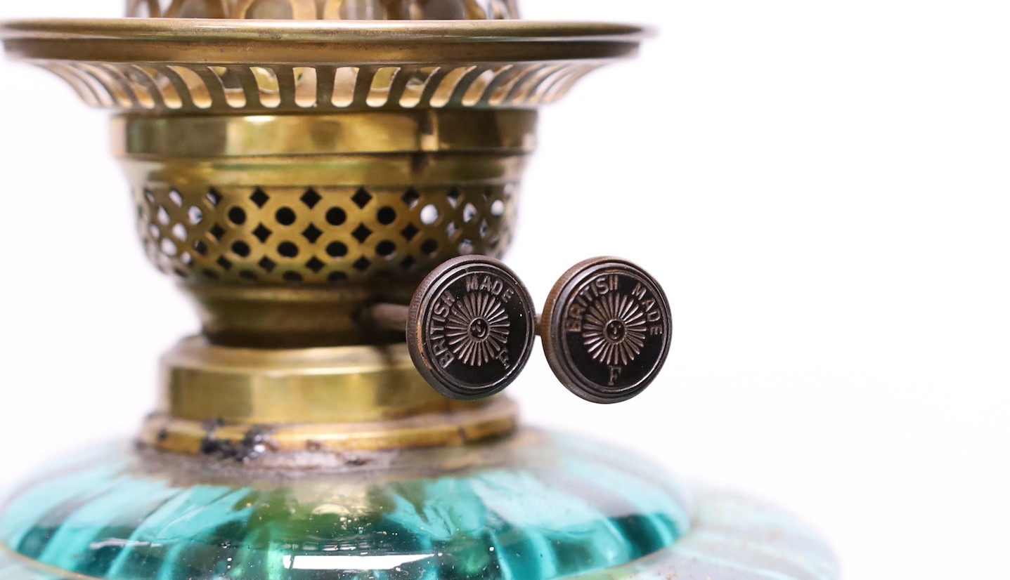 A Victorian brass oil lamp and one other lamp (2)